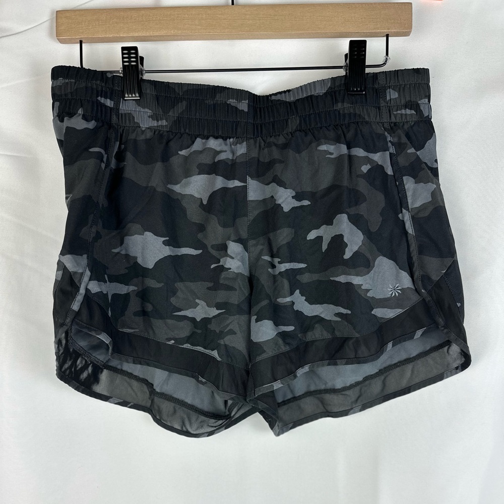 Athleta Mesh Run Racer 4" athletic shorts. Women's size medium. Black camo.